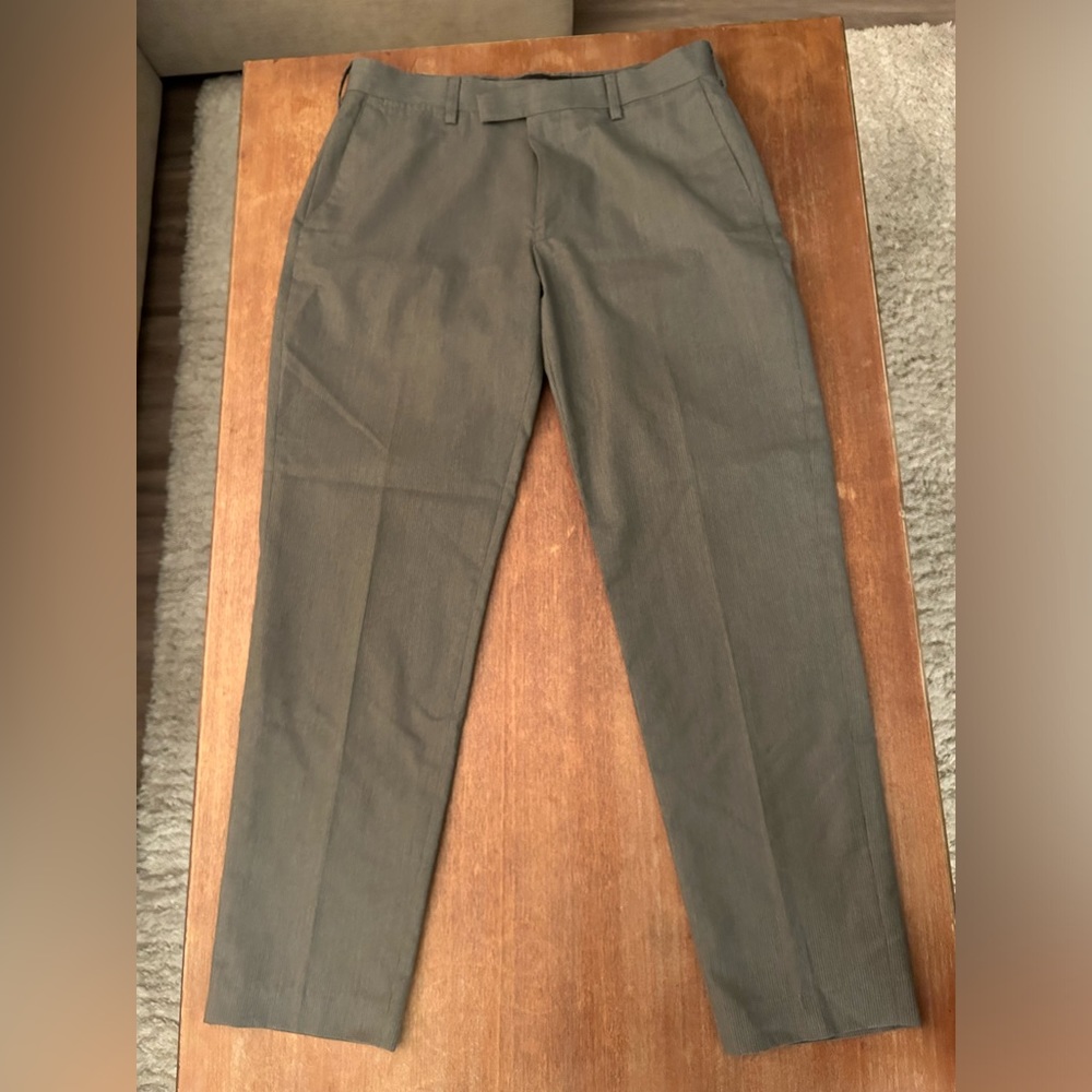 Grey dress pants with thin white pinstripes, barely worn,  no flaws